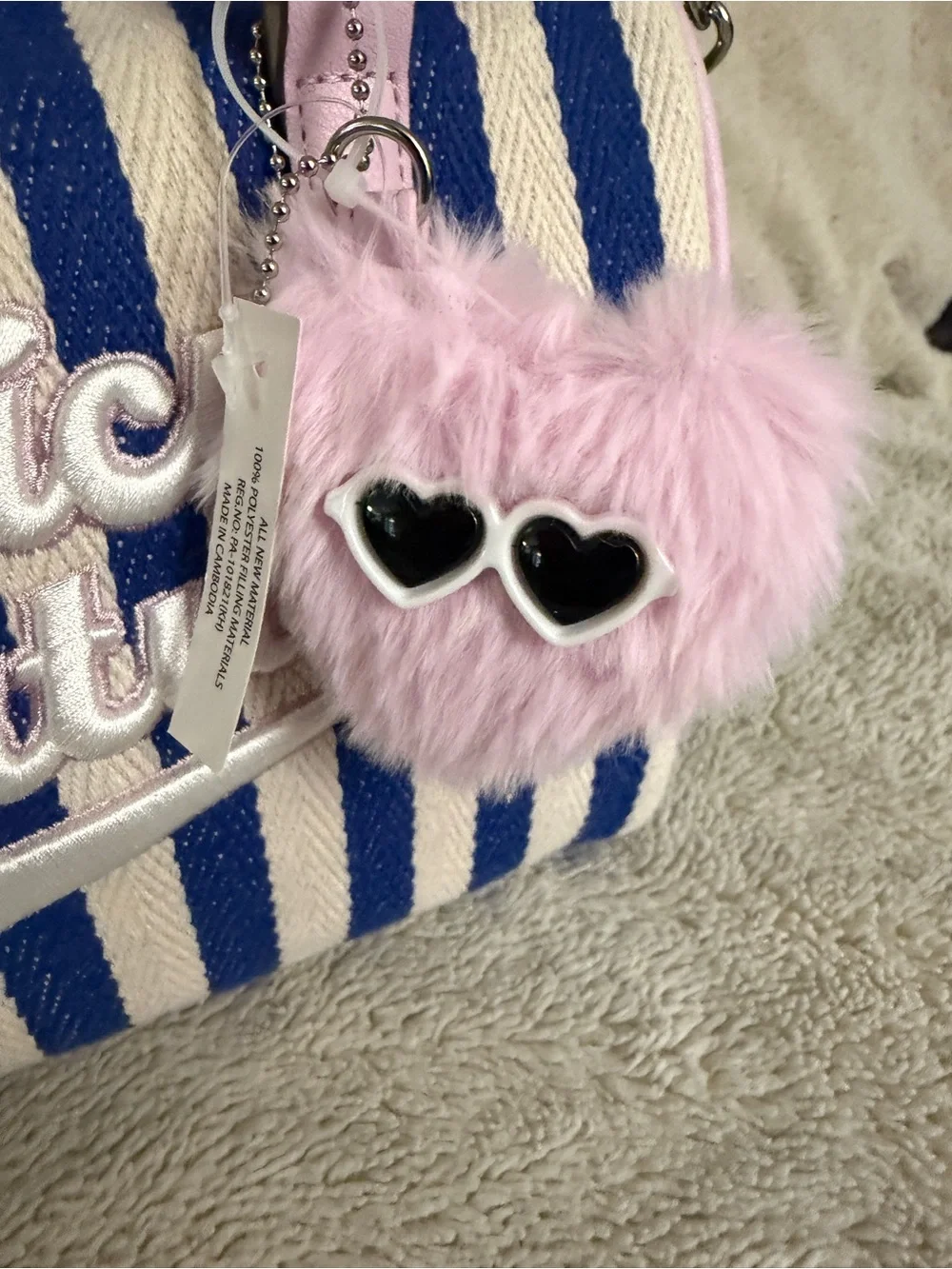 Juicy Couture Blue & Pink Striped Satchel with Pink Fur Pom